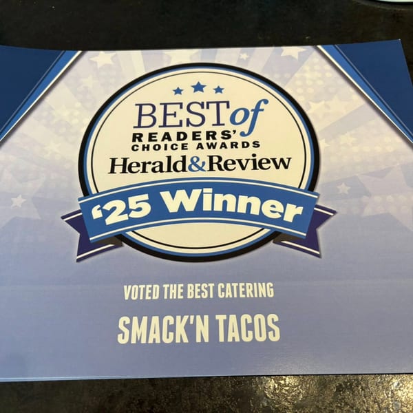 Smack'n Tacos' "Best of Readers' Choice Awards Herald&Review '25 Winner" certificate for best catering.