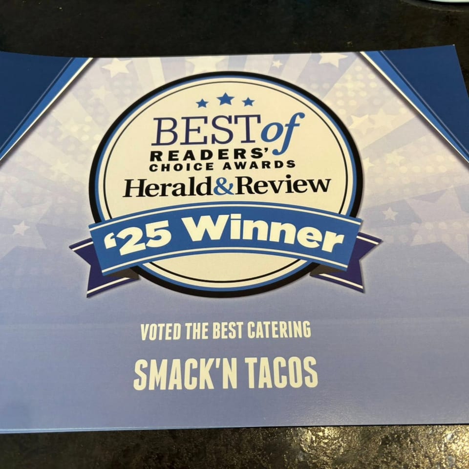Smack'n Tacos' "Best of Readers' Choice Awards Herald&Review '25 Winner" certificate for best catering.