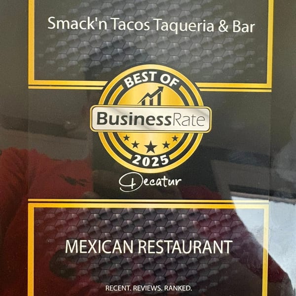 A "Best of BusinessRate 2025 Decatur Mexican Restaurant" award for Smack'n Tacos Taqueria & Bar.